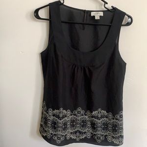 Black top with cream pattern